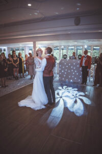 Bride and groom first dance, romantic wedding moments, wedding reception dance, newlyweds in love, first dance photography